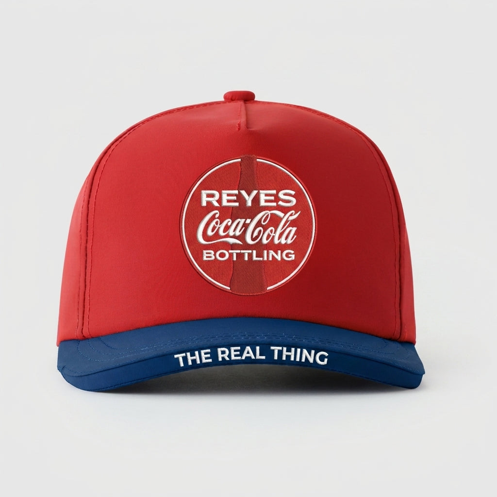 REYES COCA-COLA BOTTLING - THE REAL THING